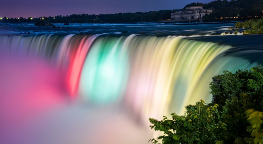Niagara Falls lit up with rainbow colors